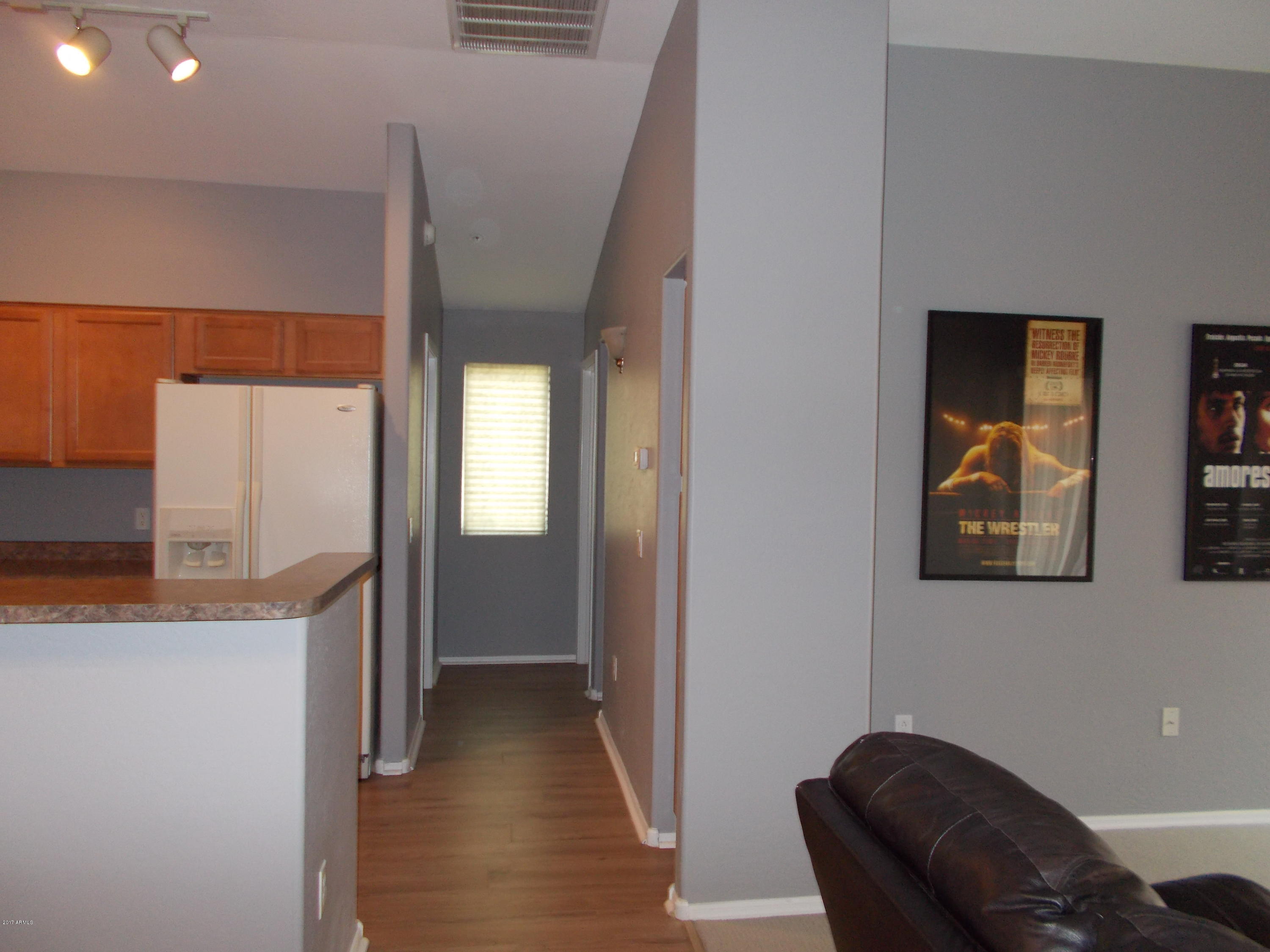 2150 East Bell Road, Unit 1149 Phoenix, AZ 85022 - Photo 22 of 30 HALLWAY TO BEDROOM #2
