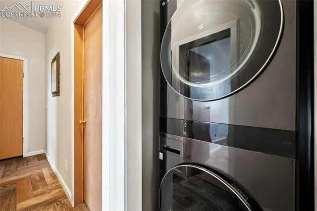 a utility room with a sink dryer and washer