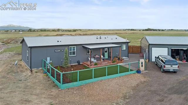 a view of a swimming pool and lounge chair