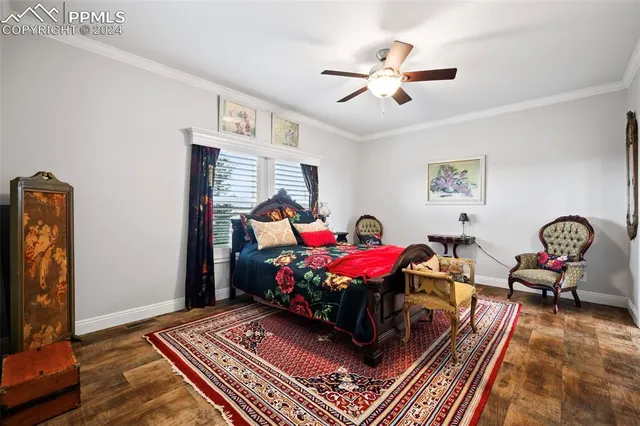 a living room with furniture a rug and a chandelier