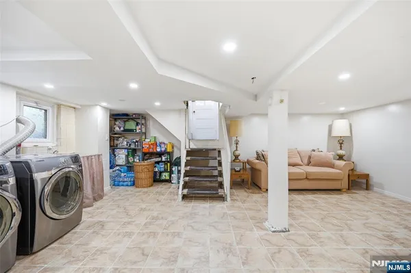 a view of a livingroom with furniture and furniture