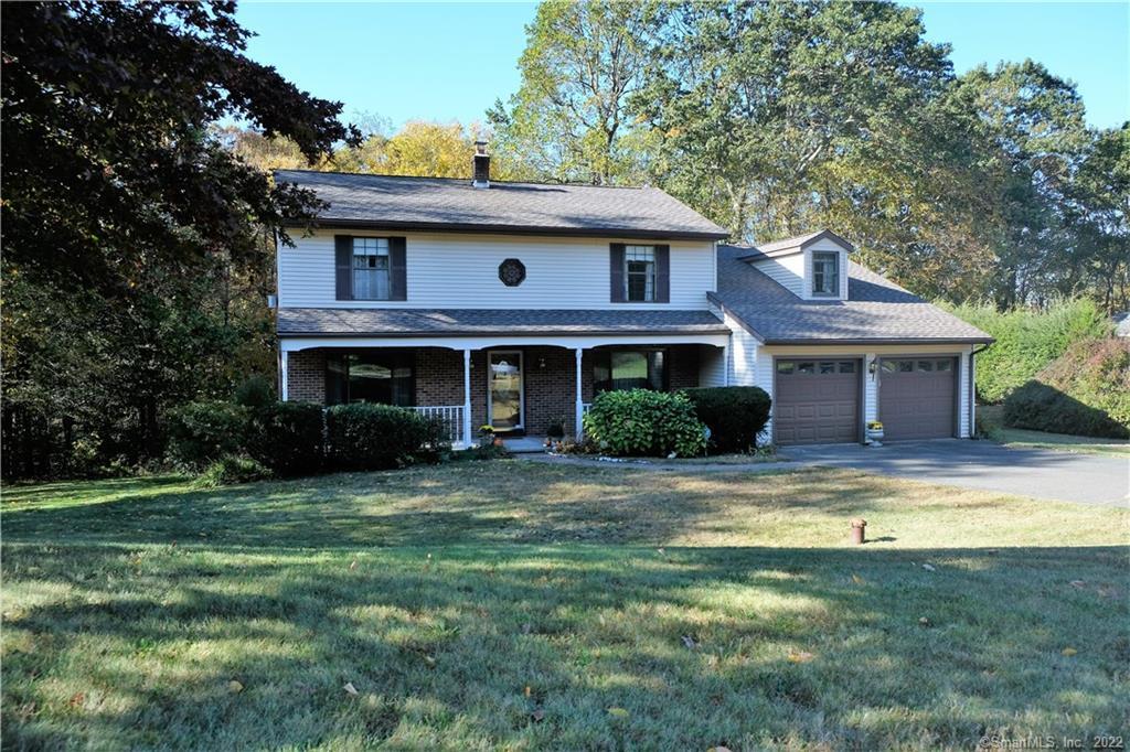 19 Timber Hill Road Prospect, CT 06712 - Photo 1 of 1 a front view of a house with a garden