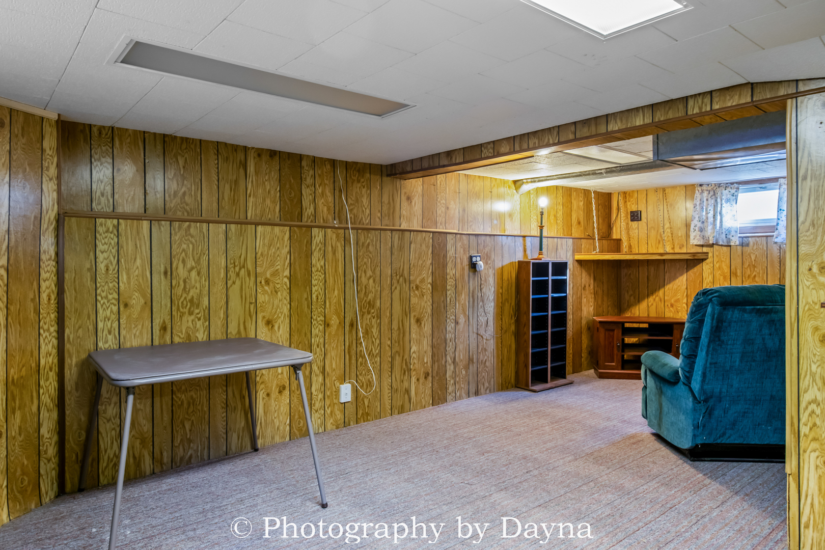 1501 South 7th Avenue Kankakee, IL 60901 - Photo 15 of 19 a bedroom with a bed and a chair