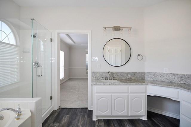 521 Mustang Ridge Drive Murphy, TX 75094 - Photo 20 of 31 a bathroom with a sink a toilet and shower