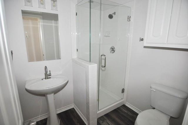 521 Mustang Ridge Drive Murphy, TX 75094 - Photo 23 of 31 a bathroom with a sink toilet and shower