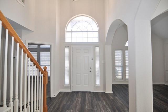 521 Mustang Ridge Drive Murphy, TX 75094 - Photo 4 of 31 wooden floor in an entryway with a livingroom