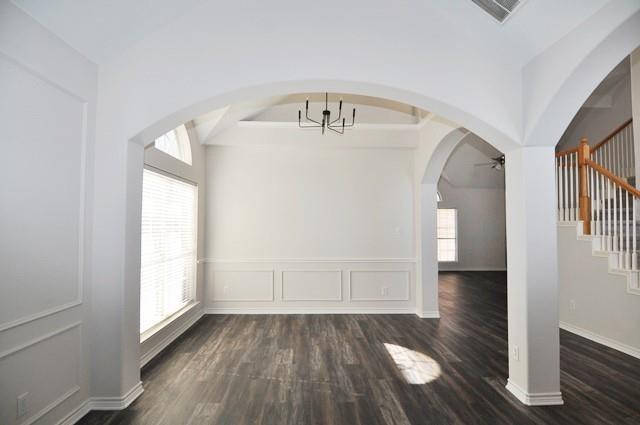 521 Mustang Ridge Drive Murphy, TX 75094 - Photo 6 of 31 a view of a hallway view with wooden floor and staircase