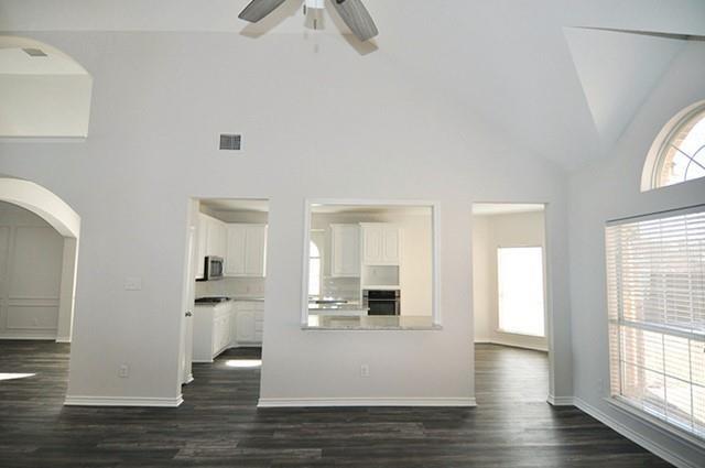521 Mustang Ridge Drive Murphy, TX 75094 - Photo 10 of 31 a view of empty room with wooden floor and fan