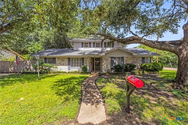 a front view of a house with swimming pool