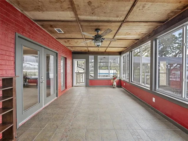 a view of a swimming pool with a patio