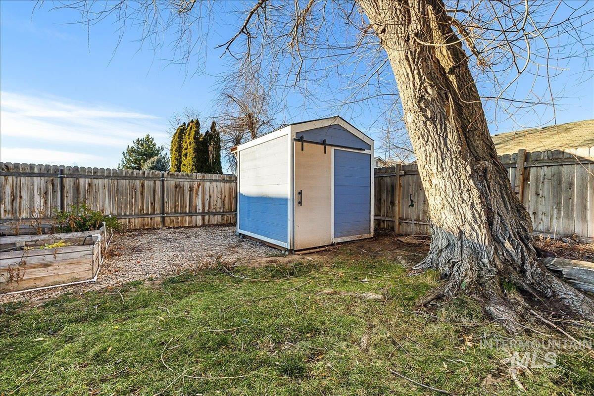 411 Hawthorne Street Nampa, ID 83686 - Photo 40 of 48 View of shed featuring a fenced backyard
