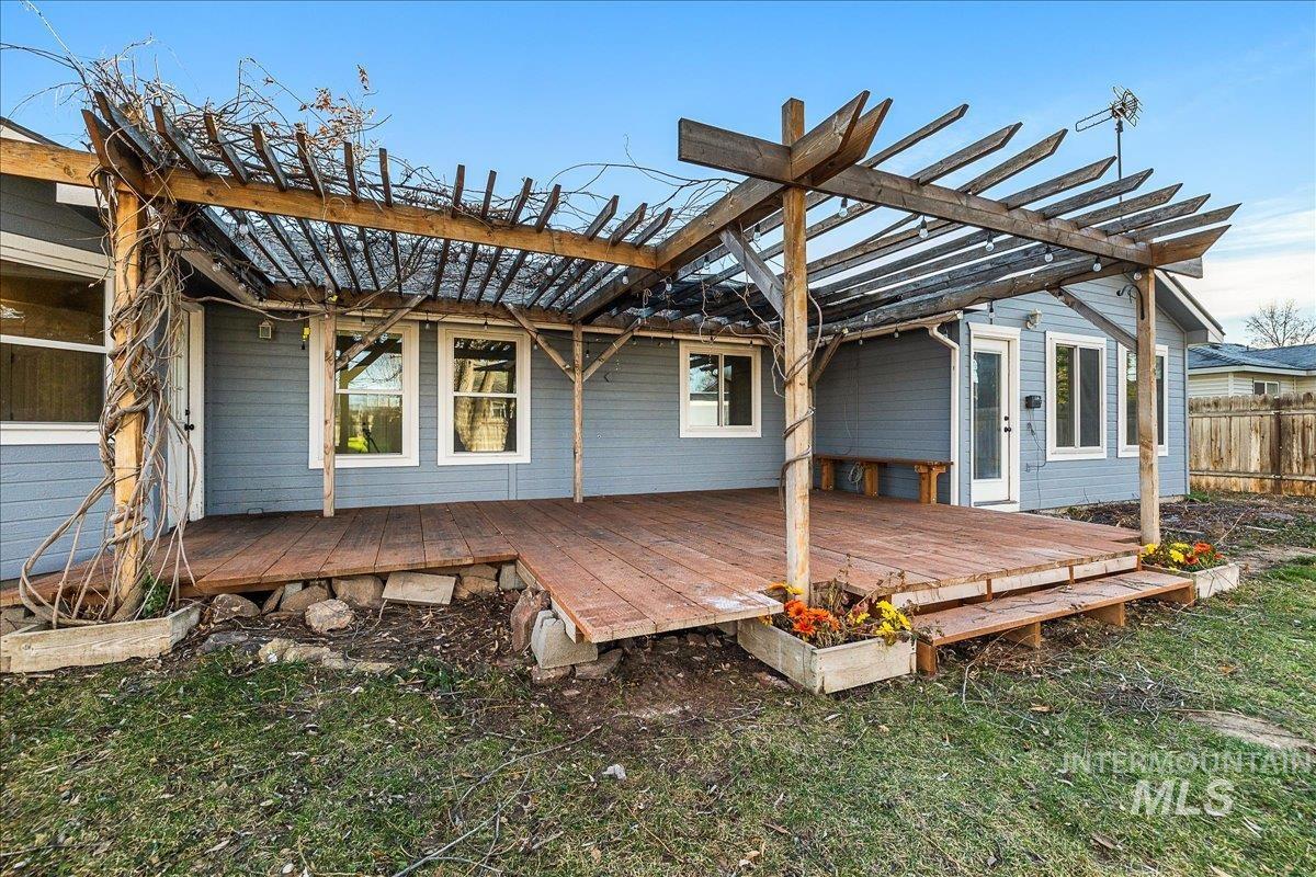 411 Hawthorne Street Nampa, ID 83686 - Photo 42 of 48 Wooden deck featuring a pergola