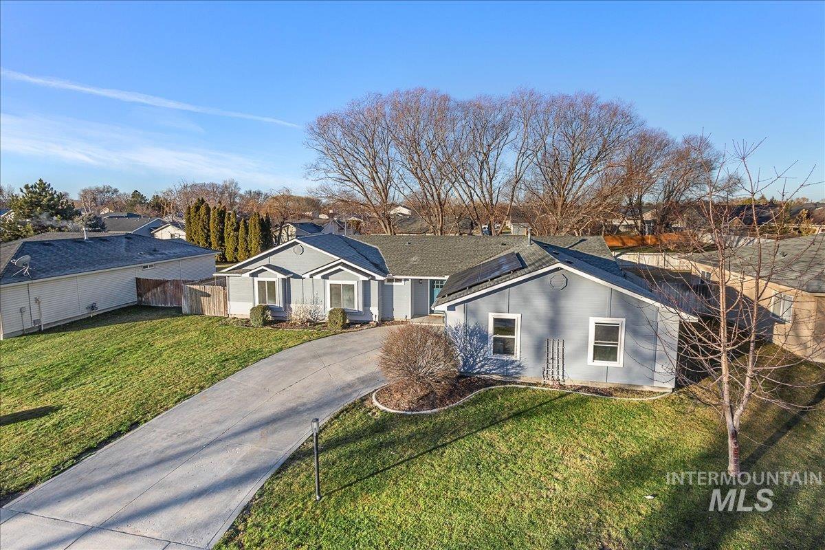 411 Hawthorne Street Nampa, ID 83686 - Photo 45 of 48 Single story home featuring a residential view and concrete driveway