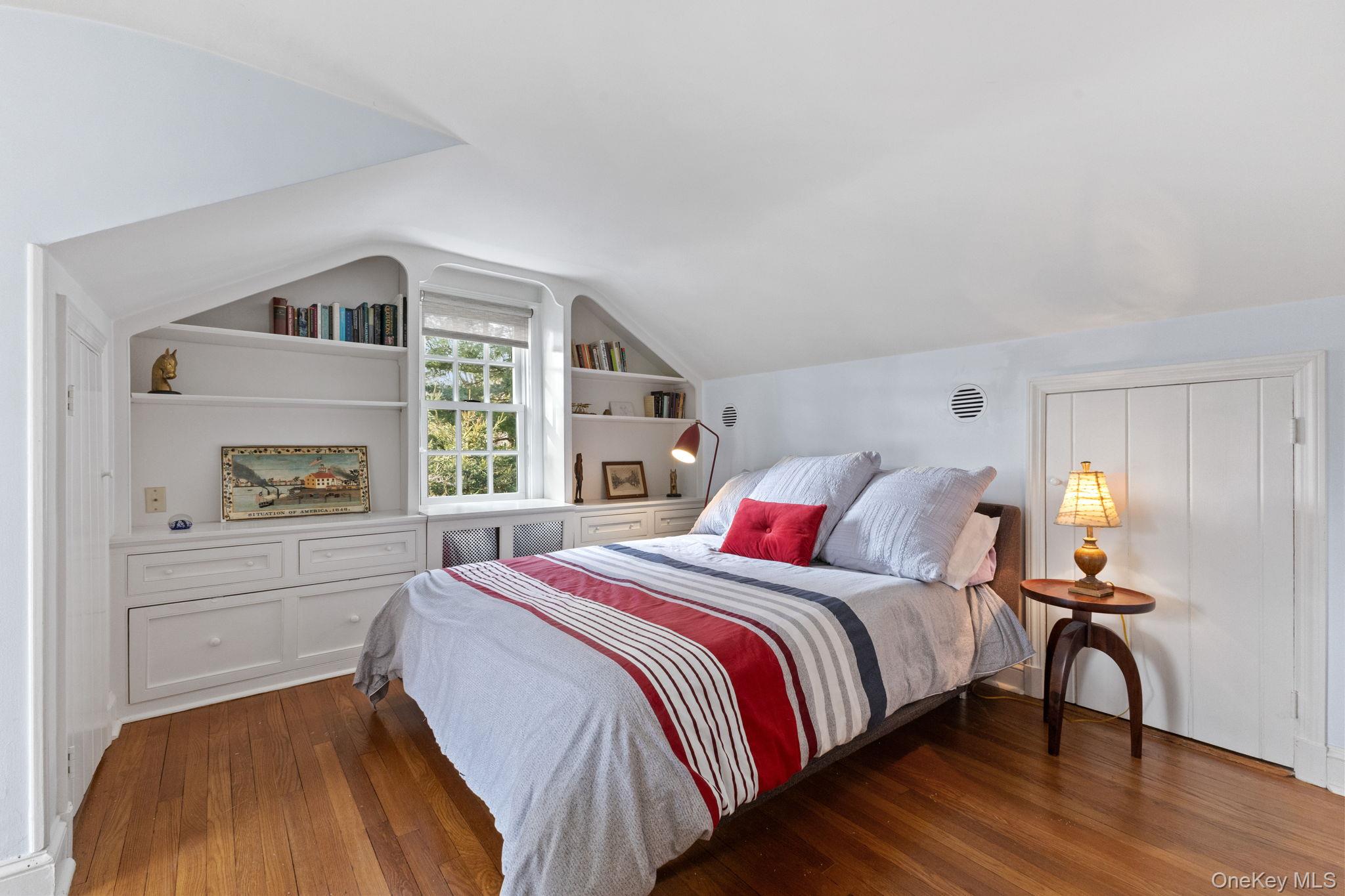 8 South Bedford Road Pound Ridge, NY 10576 - Photo 25 of 32 a bedroom with a bed and a window