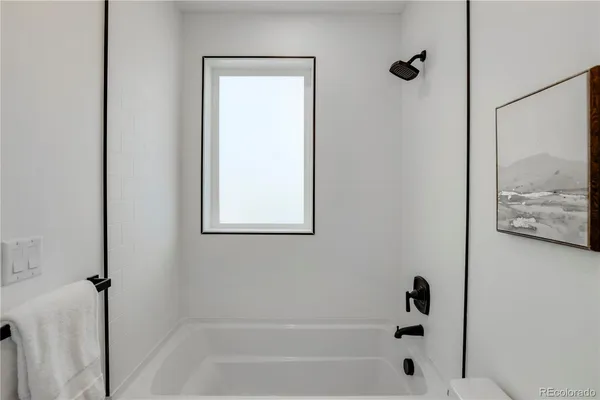 a bathroom with a bathtub