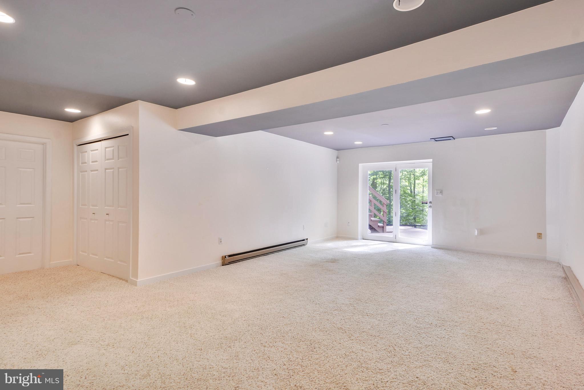 726 Intrepid Way Davidsonville, MD 21035 - Photo 24 of 30 Lower Level Family Room w Murphy wall bed