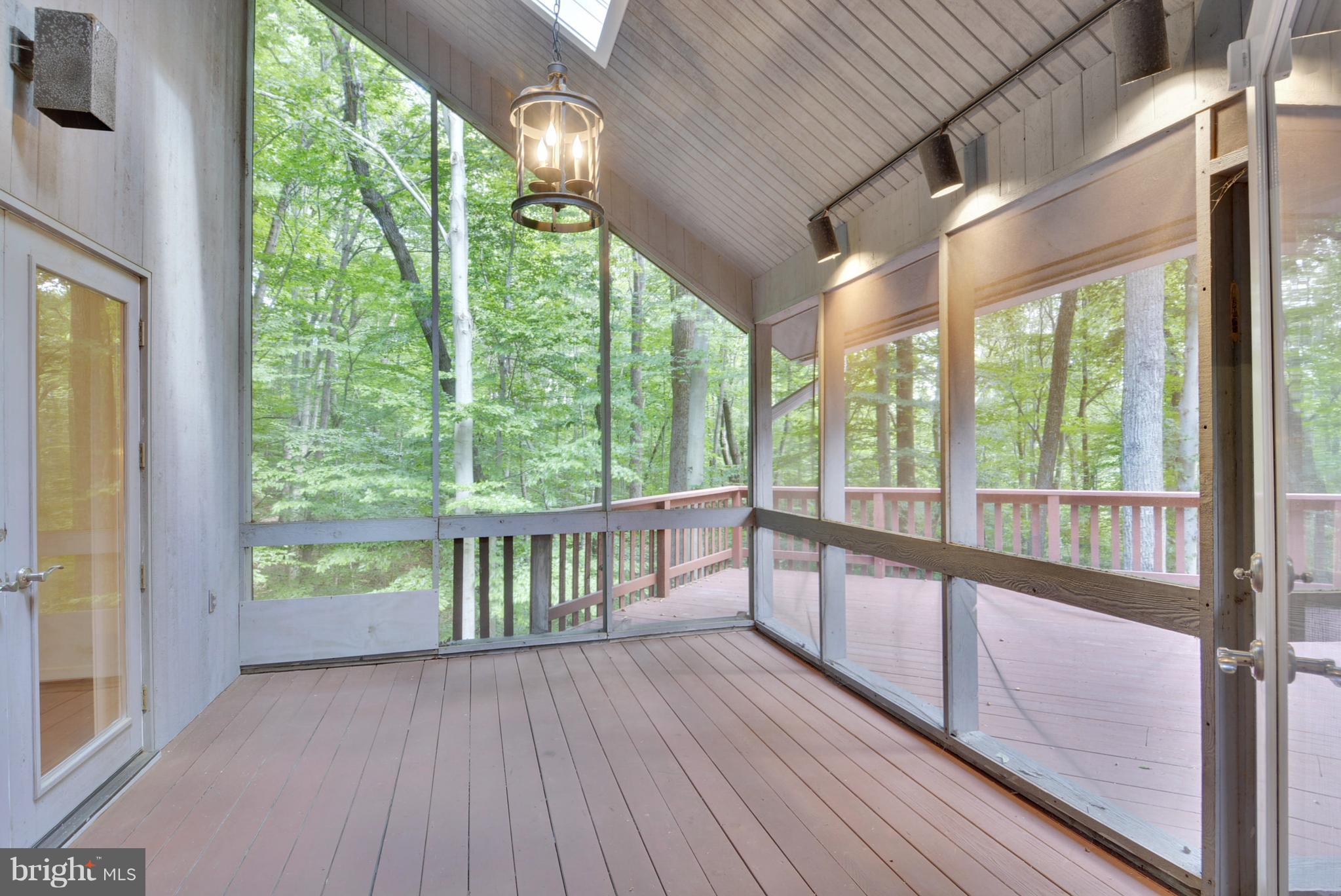 726 Intrepid Way Davidsonville, MD 21035 - Photo 7 of 30 Screened Porch offers private wood land views