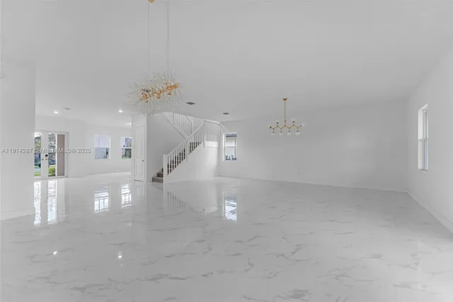 an entryway in a hall with a window