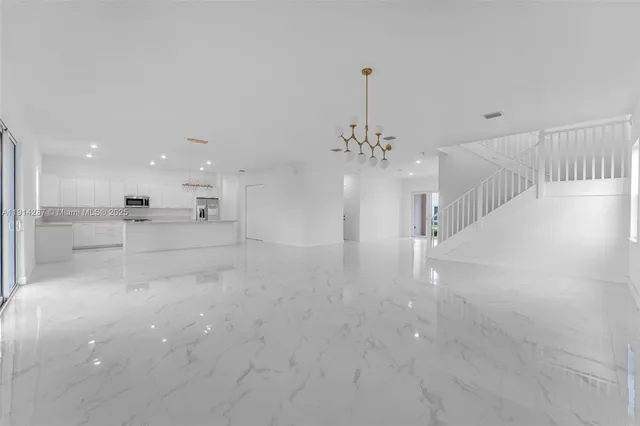 a view of a kitchen with a sink