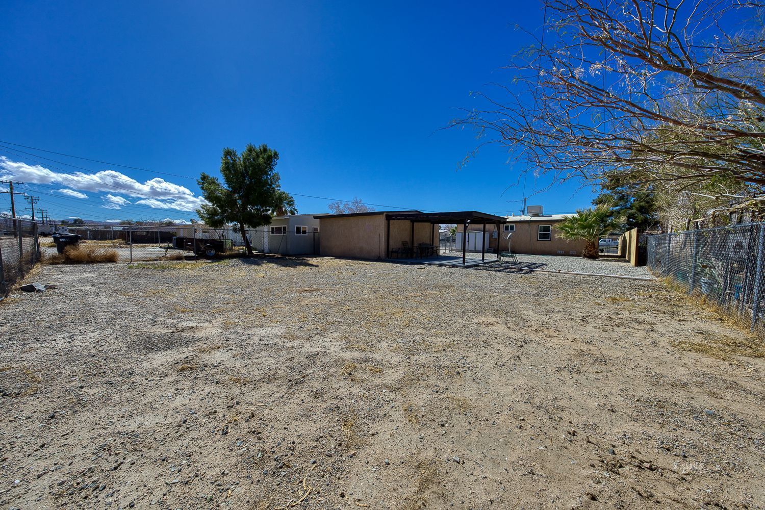 424 North Norma Street Ridgecrest, CA 93555 - Photo 24 of 27 a view of a terrace with a bench