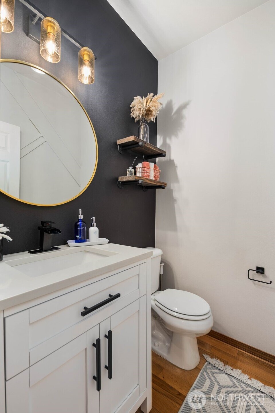 18705 3rd Avenue West Bothell, WA 98012 - Photo 12 of 35 a bathroom with a sink mirror and toilet