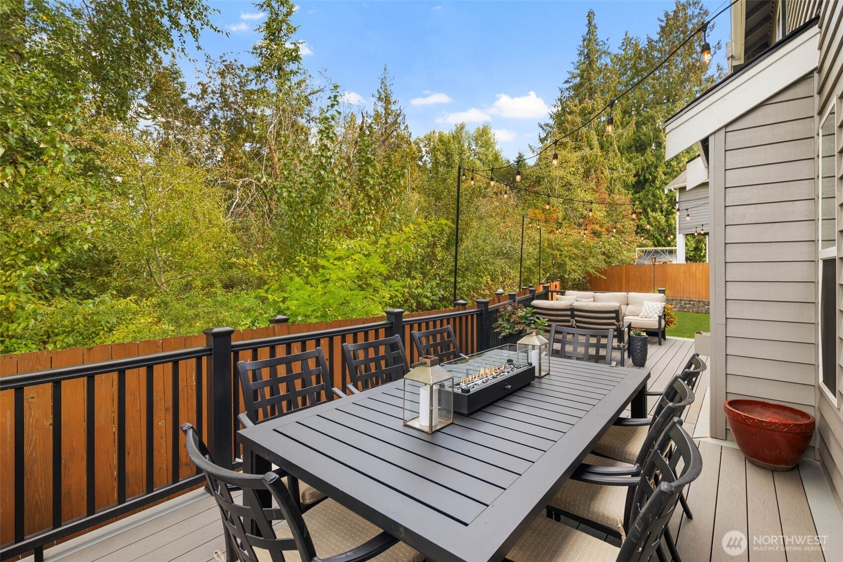 18705 3rd Avenue West Bothell, WA 98012 - Photo 26 of 35 a view of a balcony with wooden floor and outdoor seating