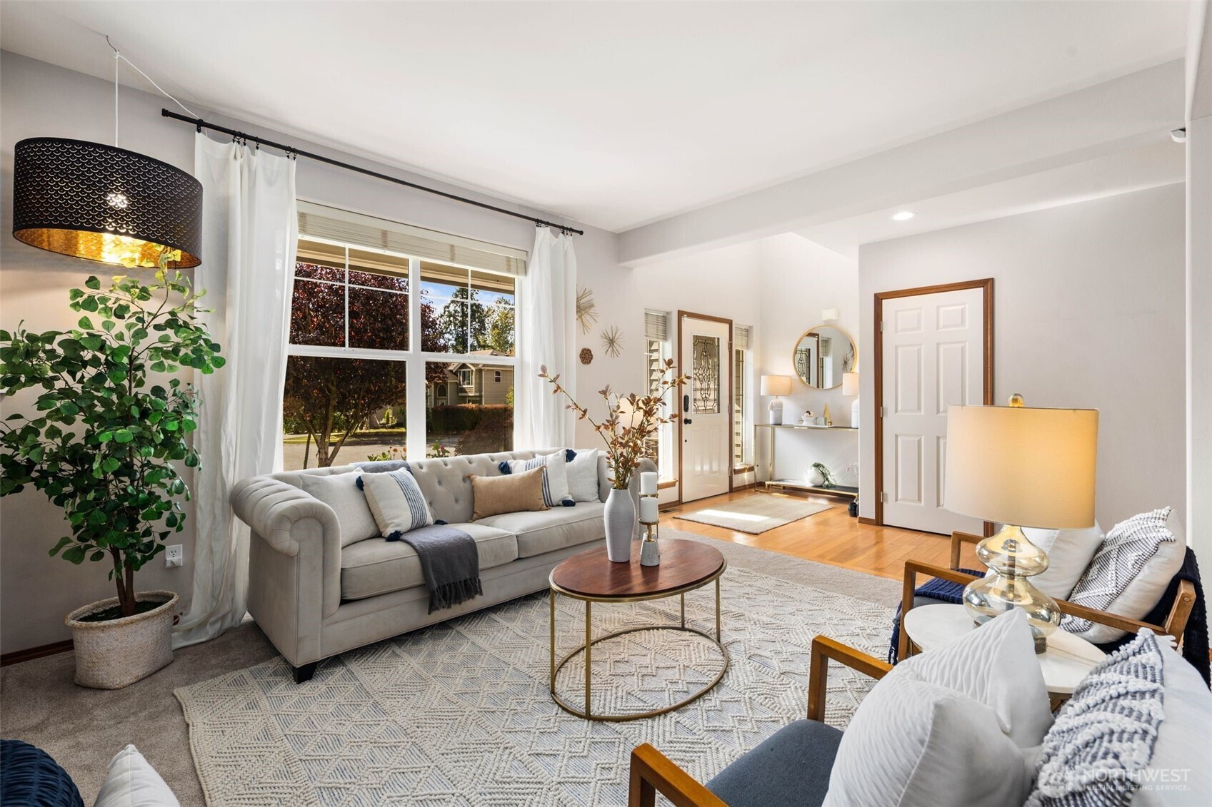 18705 3rd Avenue West Bothell, WA 98012 - Photo 3 of 35 a living room with furniture and a large window