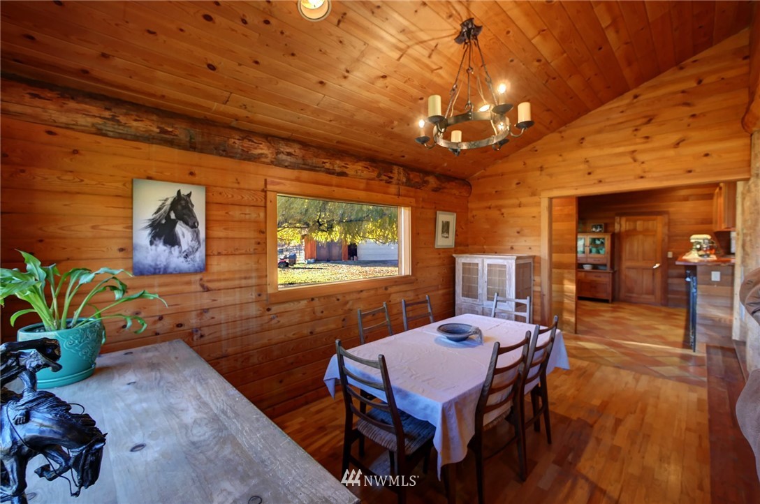 6 Beaver Pond Road Twisp, WA 98856 - Photo 27 of 40 a dining room with furniture and wooden floor
