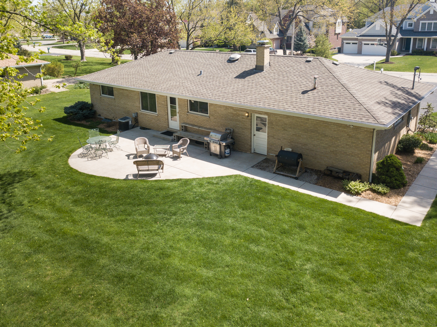 7522 Brookbank Road Willowbrook, IL 60527 - Photo 4 of 18 an aerial view of a house with swimming pool garden and patio