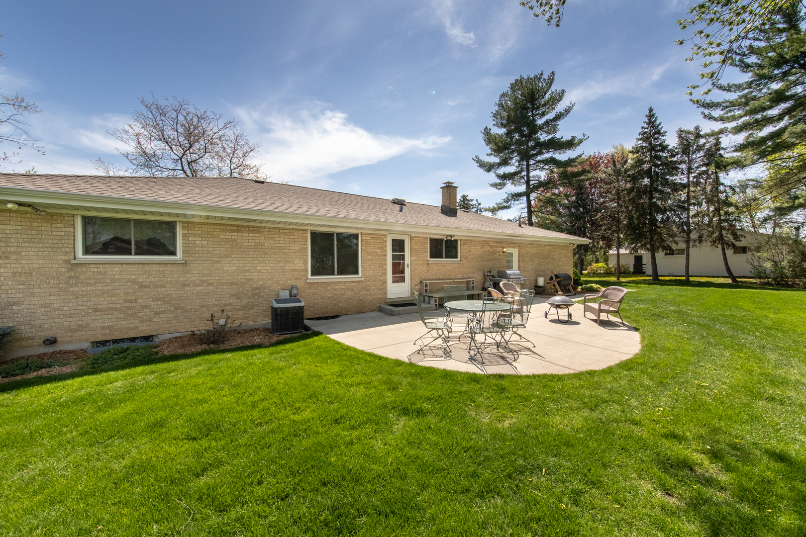 7522 Brookbank Road Willowbrook, IL 60527 - Photo 5 of 18 a view of a house with backyard and sitting area