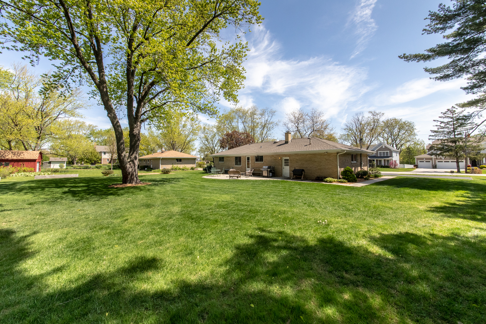 7522 Brookbank Road Willowbrook, IL 60527 - Photo 10 of 18 a front view of a house with garden
