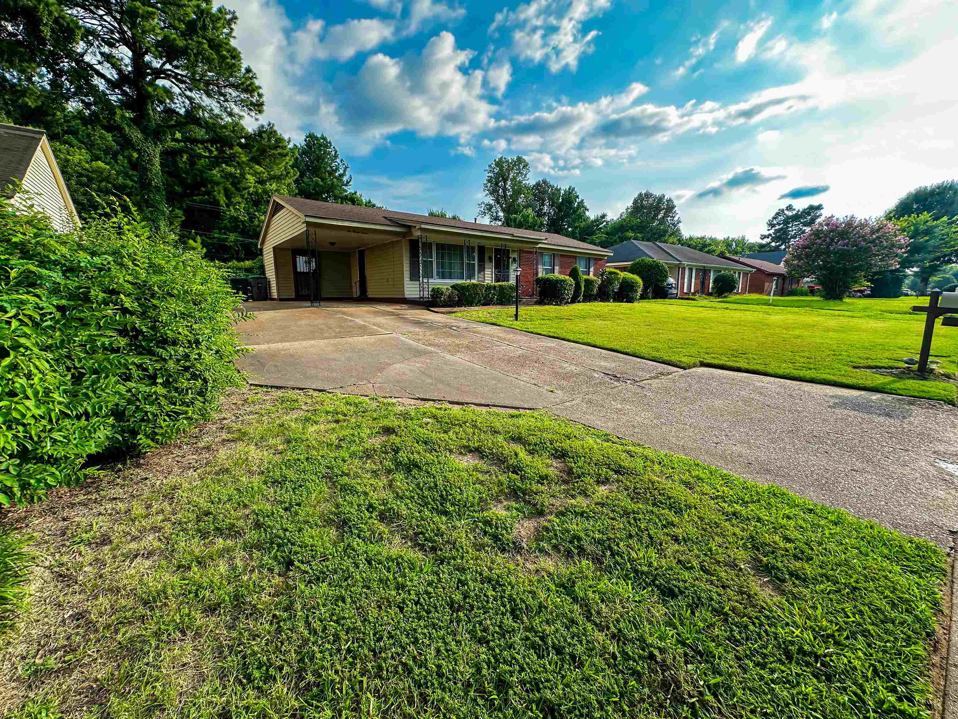 697 Shell Ln Avenue Memphis, TN 38109 - Photo 18 of 20 Single story home featuring a carport and a front lawn