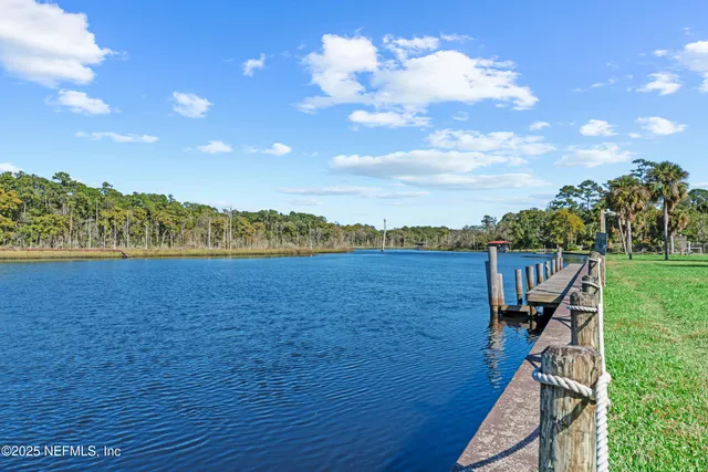 a view of a lake and a yard