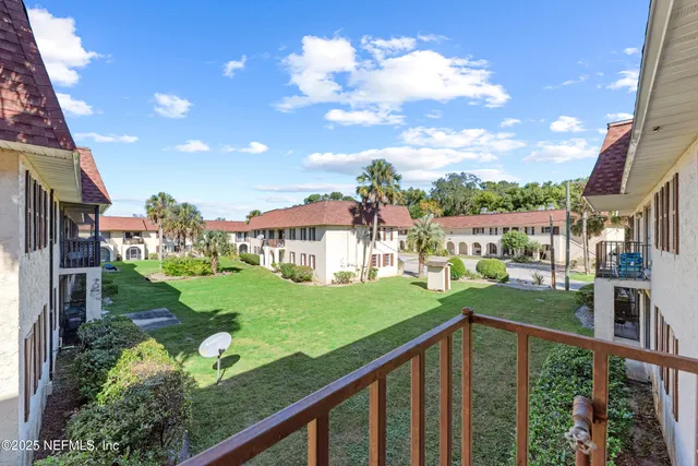 a view of a porch with a yard