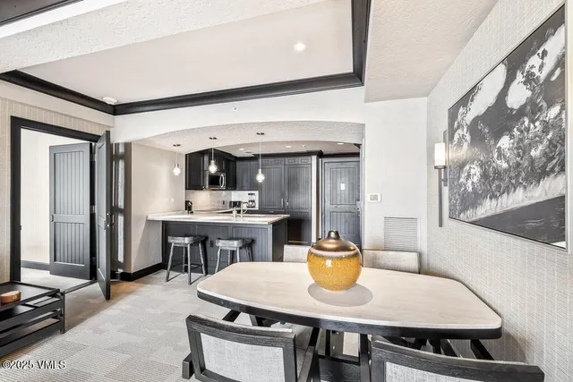 a kitchen with a sink stove and microwave