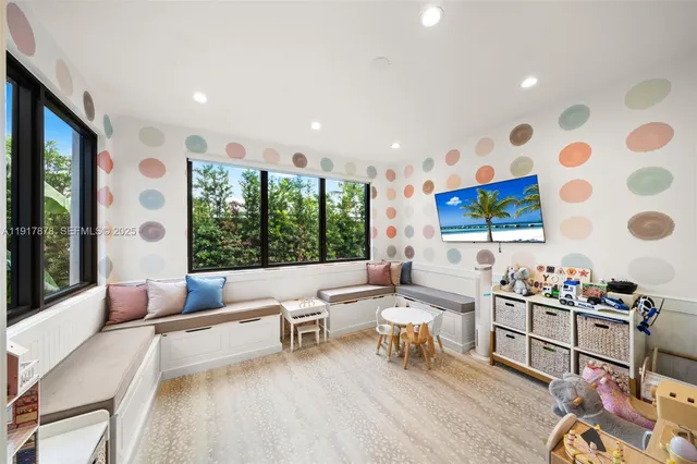 a bathroom with a toilet shower vanity and a sink