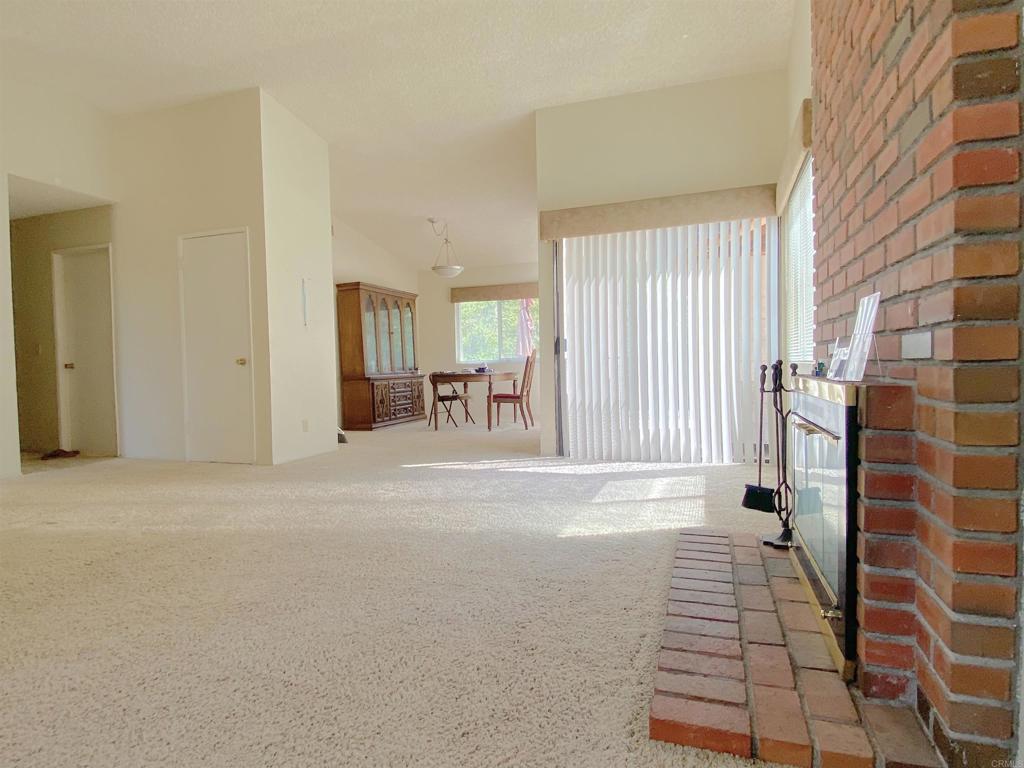 864 Willow Tree Lane Fallbrook, CA 92028 - Photo 4 of 9 a view of a bedroom with a furniture and windows
