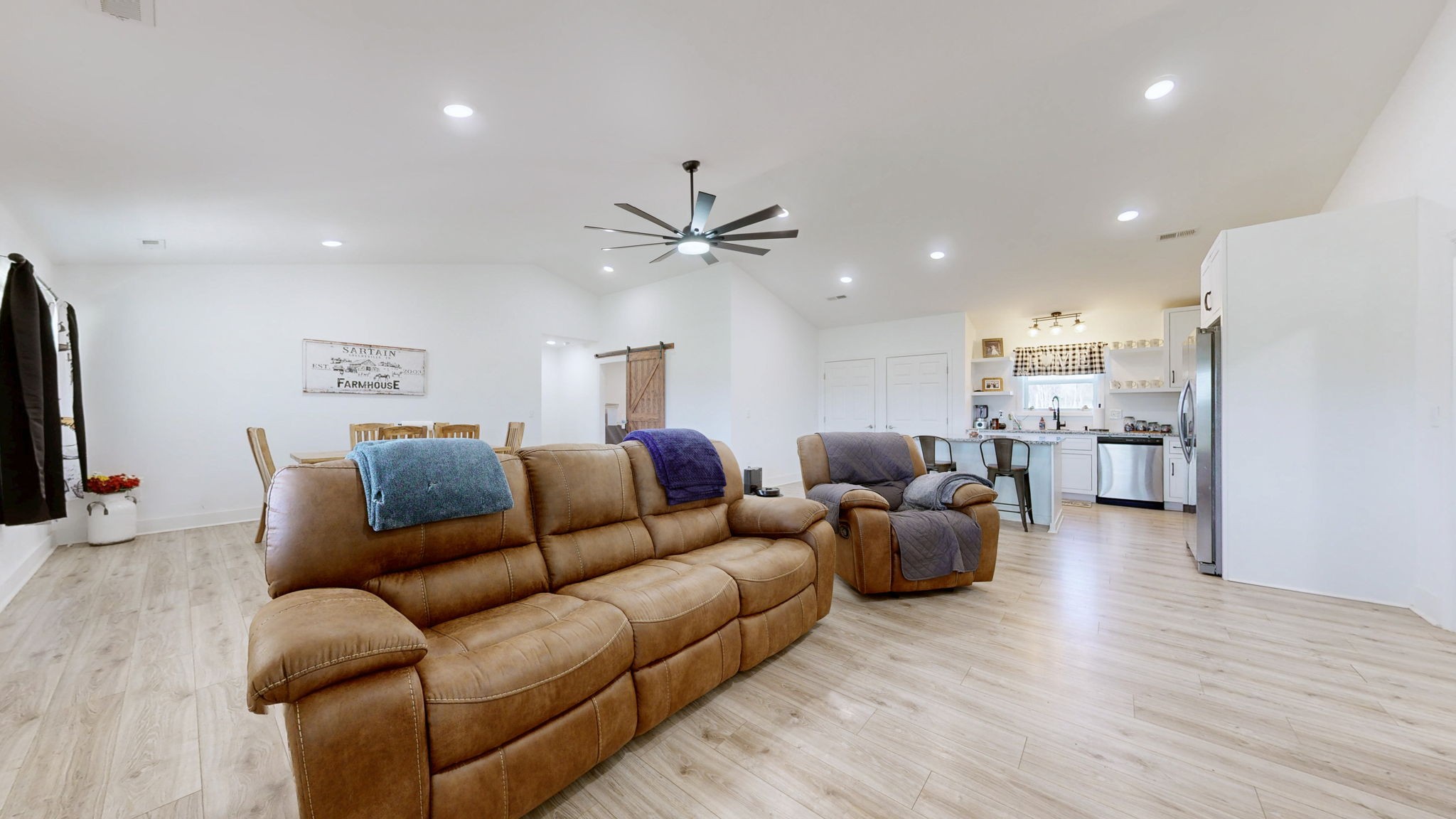 2586 Brown Shop Road Petersburg, TN 37144 - Photo 17 of 57 a living room with furniture kitchen view and a wooden floor