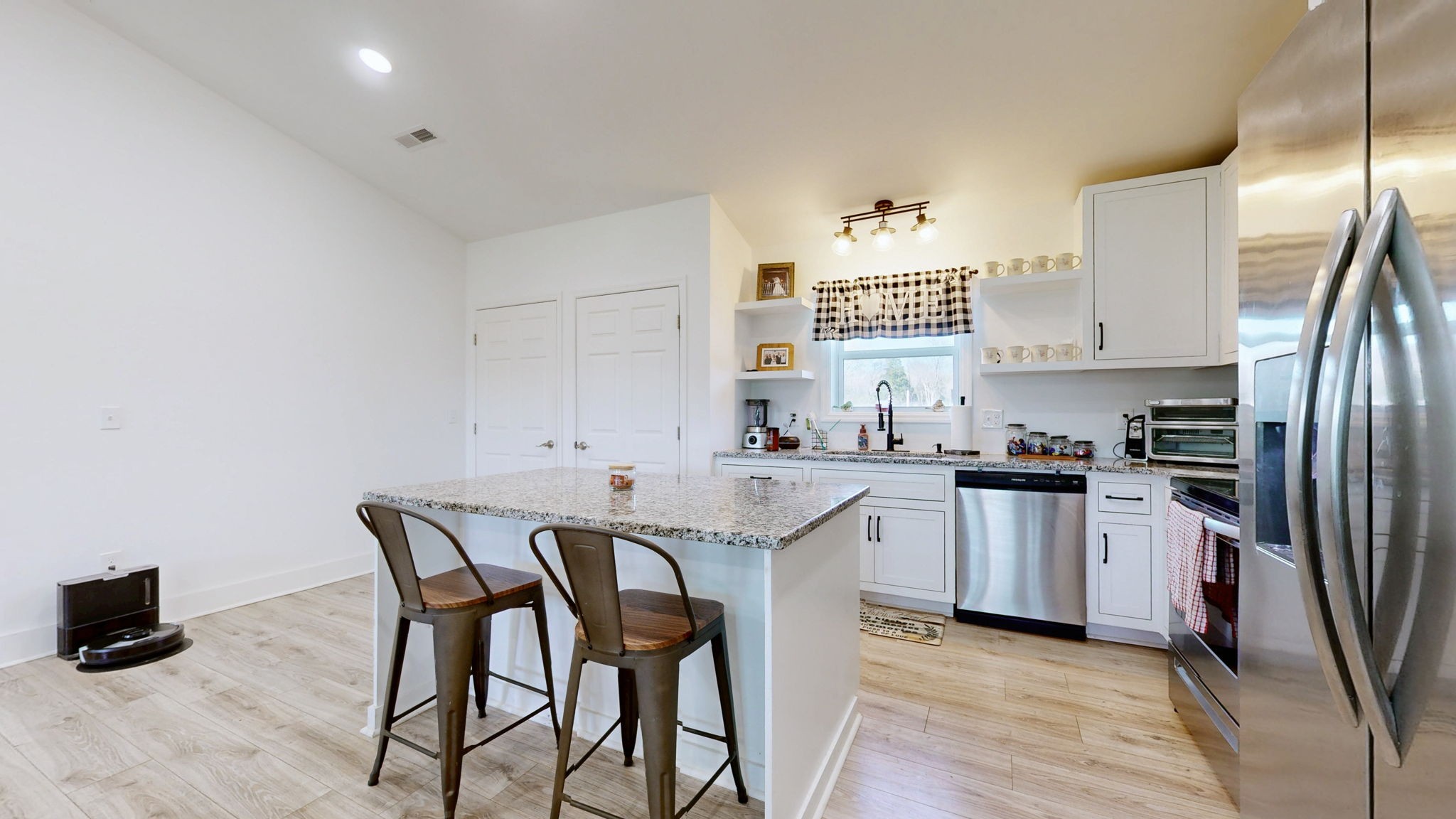 2586 Brown Shop Road Petersburg, TN 37144 - Photo 23 of 57 a kitchen that has a lot of cabinets in it and appliances