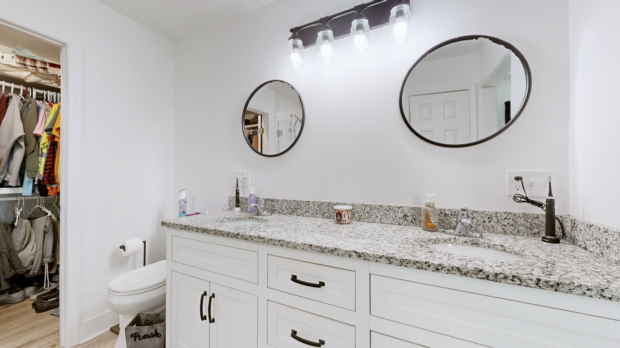 2586 Brown Shop Road Petersburg, TN 37144 - Photo 30 of 57 a bathroom with a granite countertop sink and a mirror