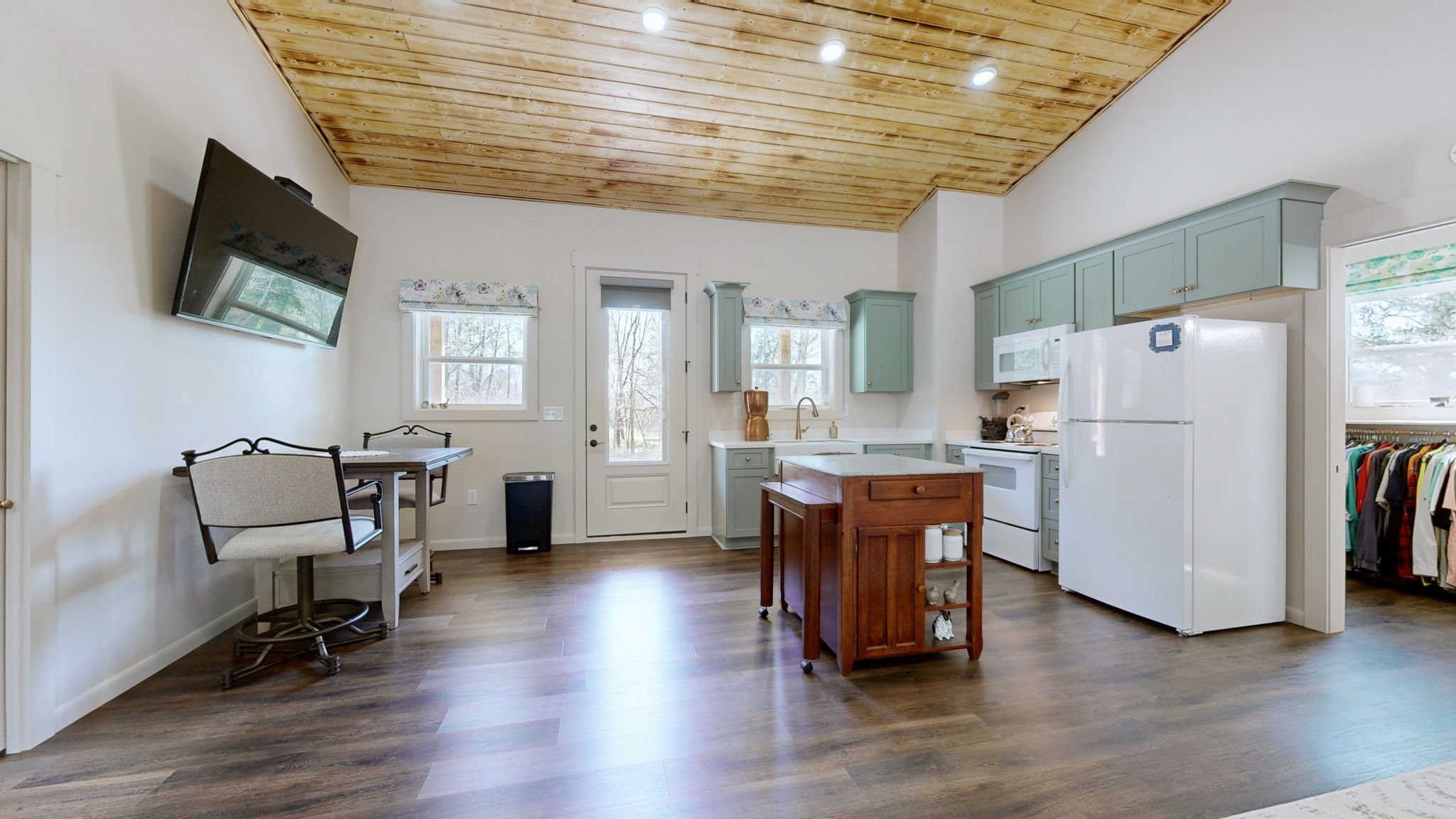 2586 Brown Shop Road Petersburg, TN 37144 - Photo 47 of 57 a kitchen with stainless steel appliances wooden floor and a refrigerator