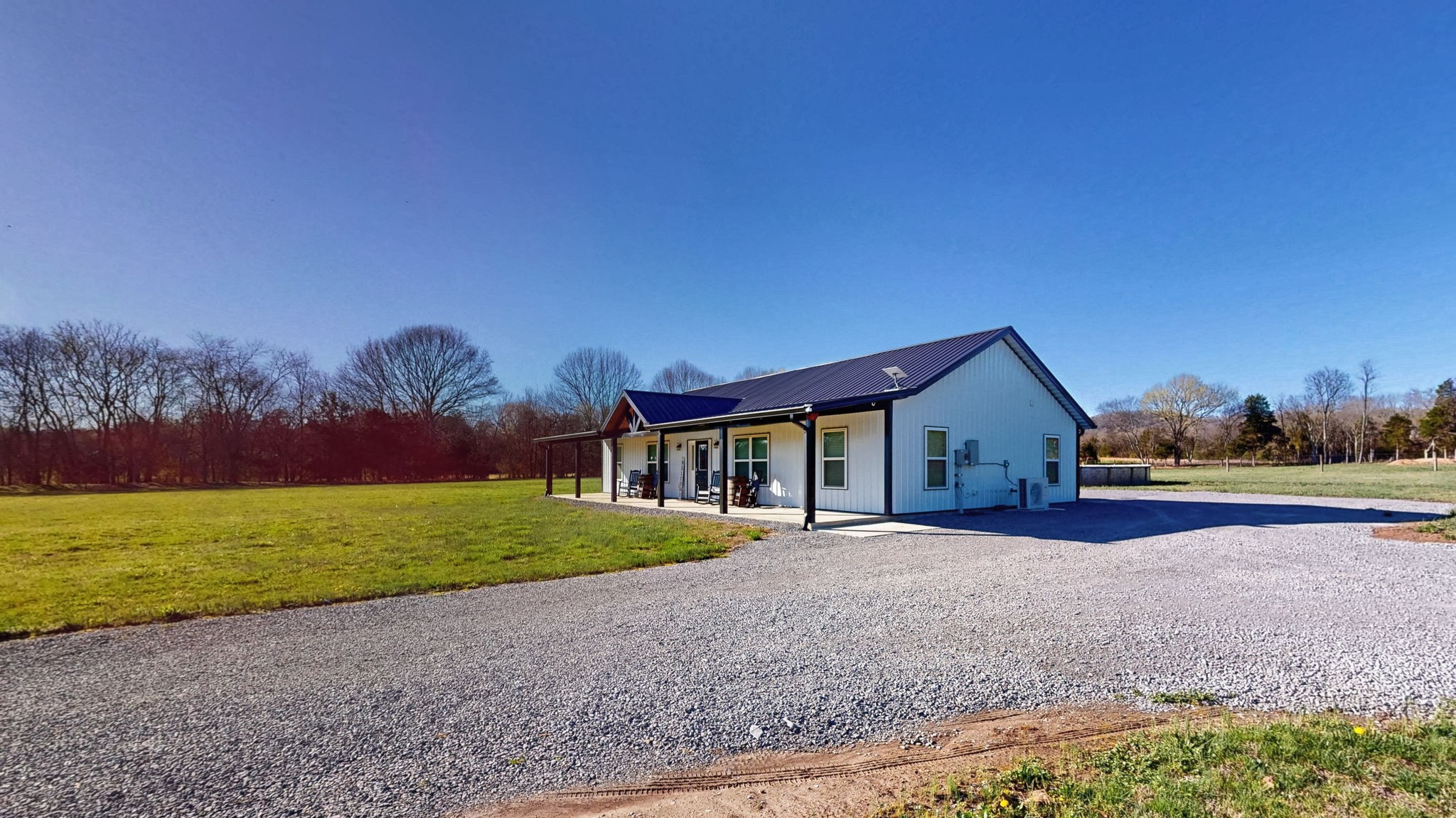 2586 Brown Shop Road Petersburg, TN 37144 - Photo 5 of 57 a front view of a house with a yard and garage