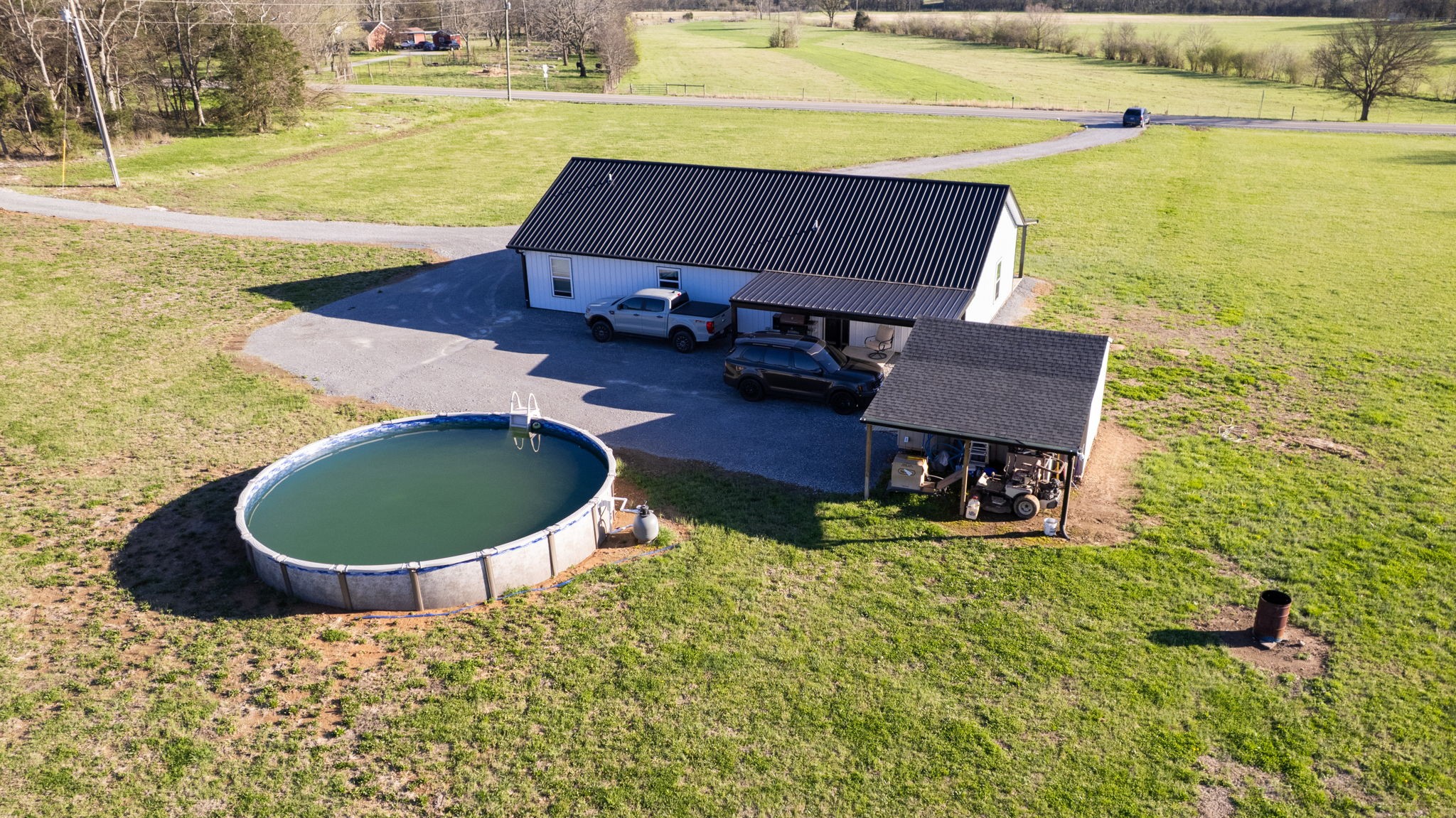 2586 Brown Shop Road Petersburg, TN 37144 - Photo 9 of 57 a view of a swimming pool with an outdoor space and seating area