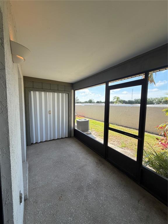 2131 Ridge Road South, Unit 135 Largo, FL 33778 - Photo 30 of 33 a view of an empty room with a large window