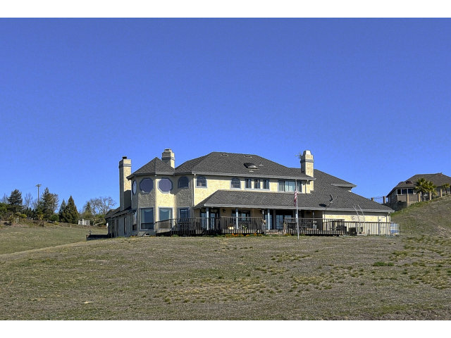 3023 3 Springs Road Mount Hamilton, CA 95140 - Photo 2 of 24 a front view of a house with a garden