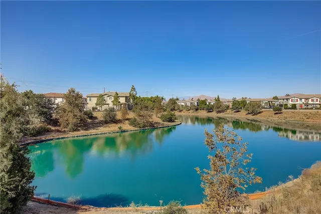 a view of a lake with a city view