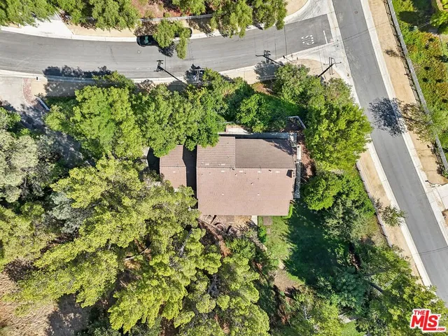 a view of a garden with a fountain