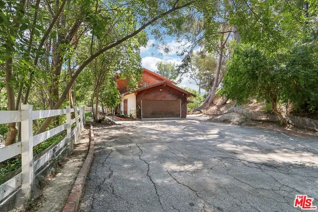 a view of backyard of house