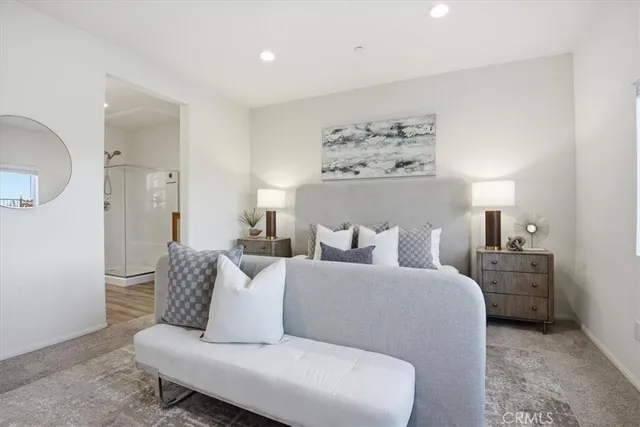 a living room with furniture and a lamp