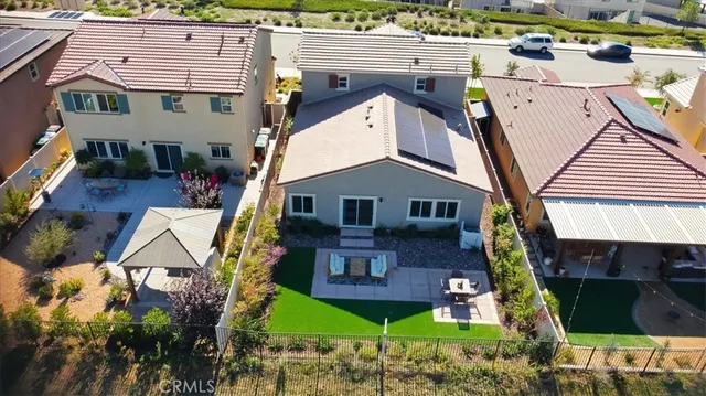 a aerial view of a house with a yard